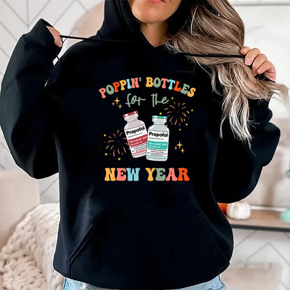 Funny Nurse Shirt, Nurse Unisex T-Shirt/Hoodie/Sweatshirt HLT00 -ICU Nurse New Year Eve Outfit Poppin Bottles ER RN CNA Nurse T-Shirt