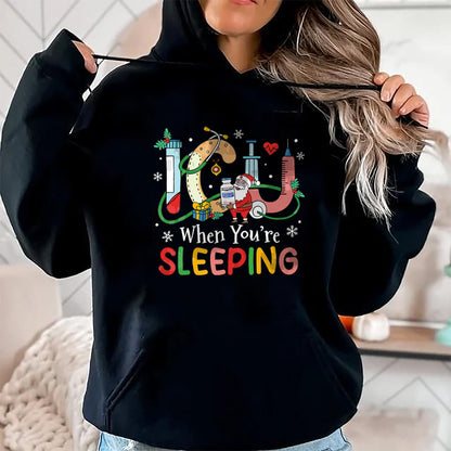 Funny Nurse Shirt, Nurse Unisex T-Shirt/Hoodie/Sweatshirt HLT00 - When You're Sleeping Funny ICU Nurse Christmas T-Shirt
