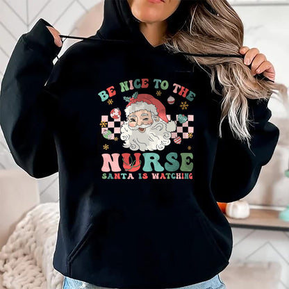 Funny Nurse Shirt, Nurse Unisex T-Shirt/Hoodie/Sweatshirt HLT00 - Nurse Christmas Shirt Be Nice To The Nurse Santa Is Watching T-Shirt