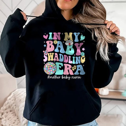 Funny Nurse Shirt, Nurse Unisex T-Shirt/Hoodie/Sweatshirt HLT00 - In My Baby Swaddling Era Mother Baby Nurse Postpartum Groovy T-Shirt