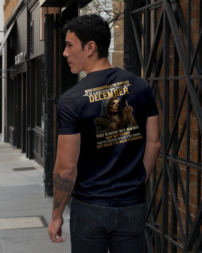 DECEMBER - NEVER UNDERESTIMATE - BIRTHDAY T-SHIRT FOR MEN - MALE / CCDI12 (SKU26T-01-06-12)